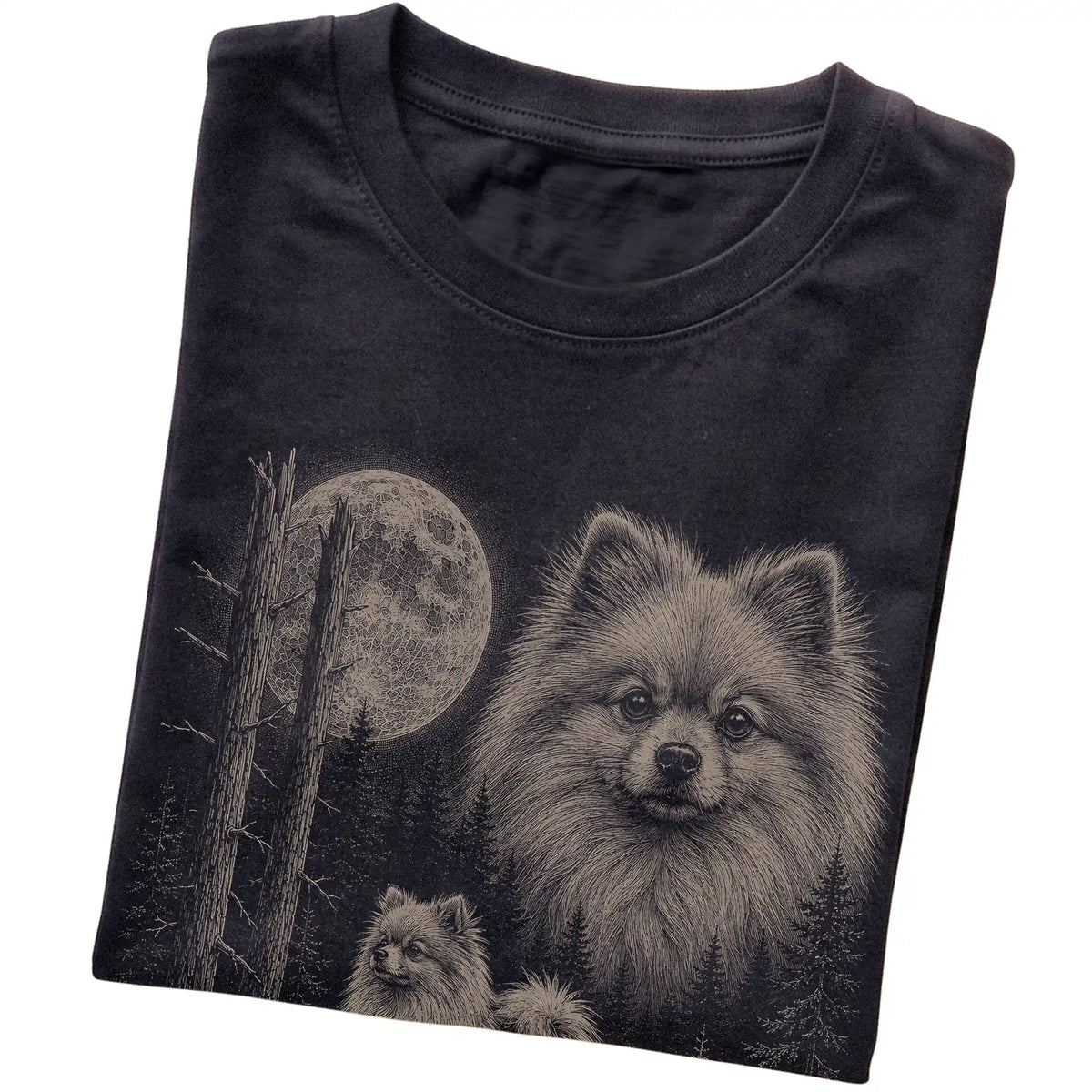 Folded black Softstyle T-shirt showing the Pomeranian Moonlit Forest graphic