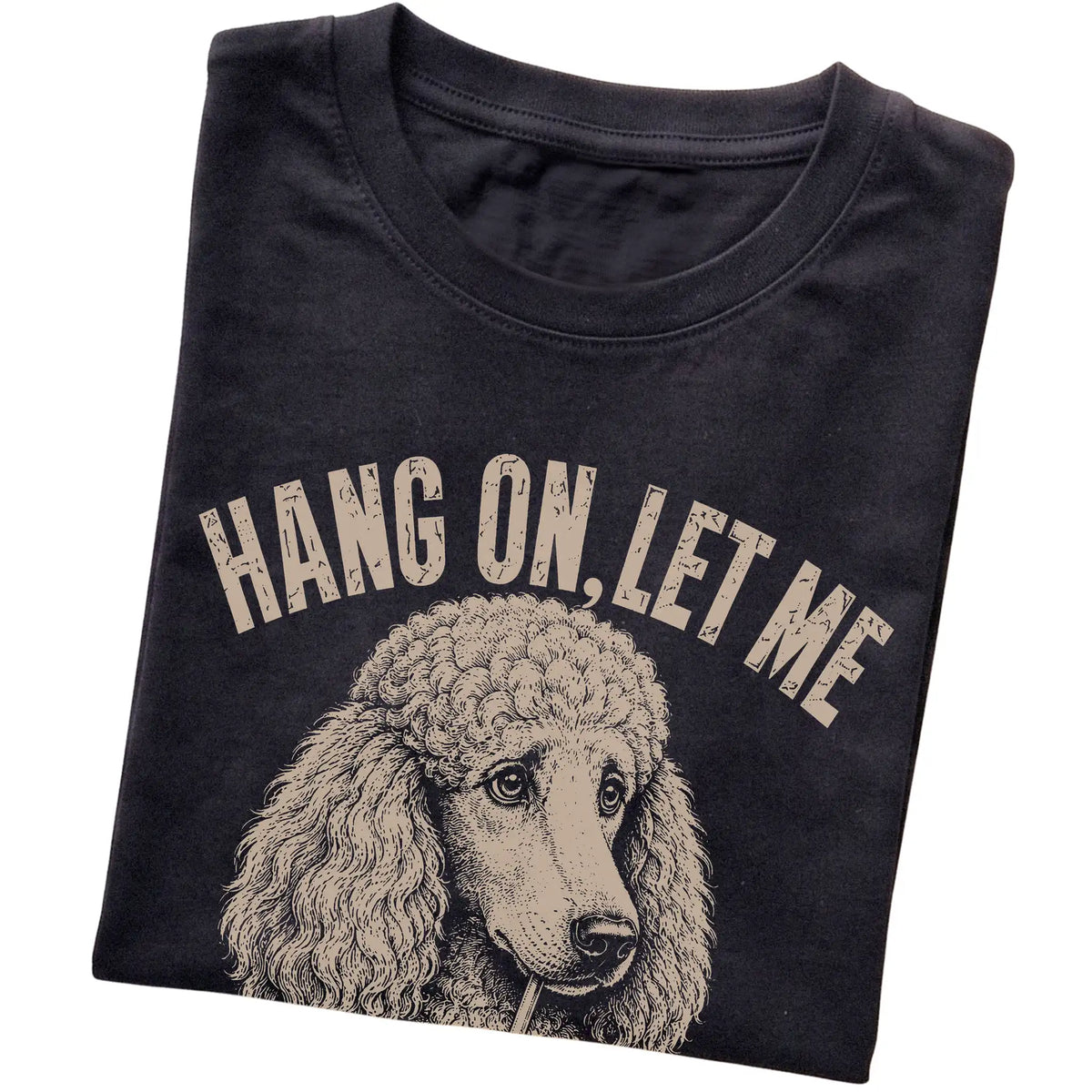 Black T-shirt featuring Overthinking Poodle, folded presentation