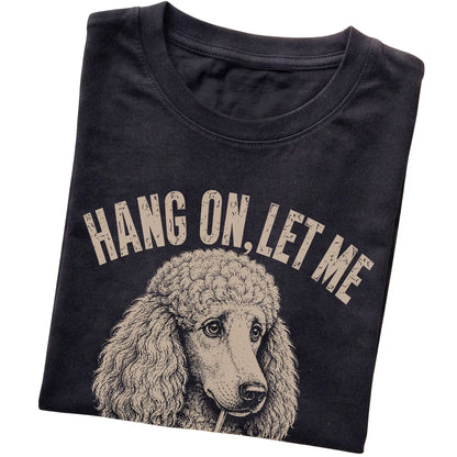 Black T-shirt featuring Overthinking Poodle, folded presentation