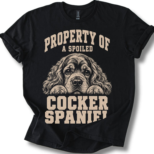 Black Cocker Spaniel T-shirt with a dog portrait and “Property of a Spoiled” lettering.