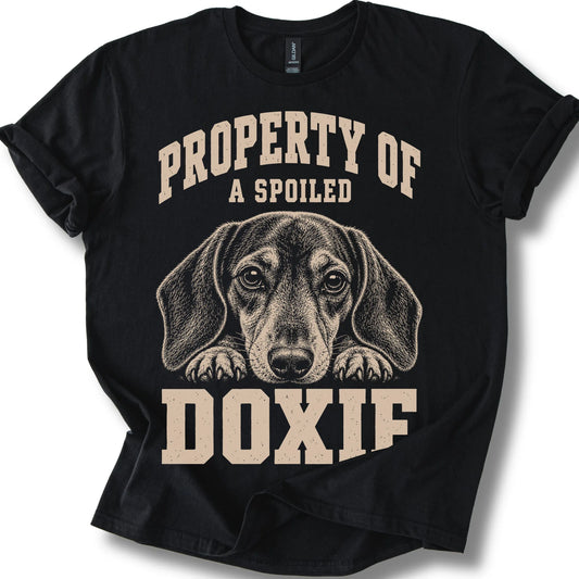 Black Dachshund T-shirt with a dog portrait and “Property of a Spoiled” lettering.