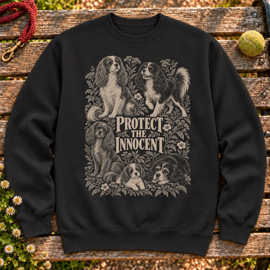 Protect the Innocent Cavalier King Charles Spaniel design on a Black sweatshirt