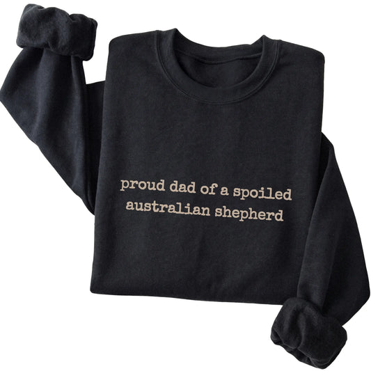 Black Proud Dad of a Spoiled Australian Shepherd sweatshirt folded to show the printed design