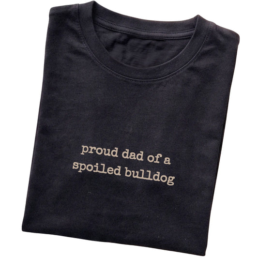 Black Proud Dad of a Spoiled Bulldog T-shirt folded to show the printed design