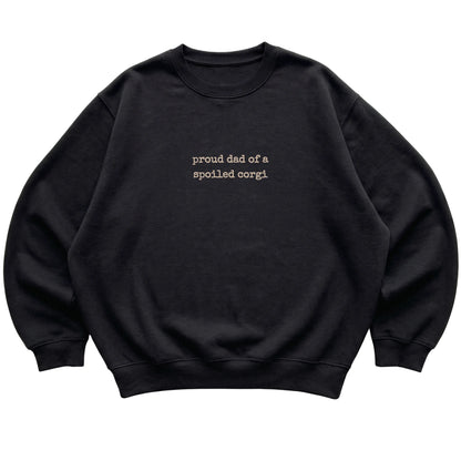 Black Proud Dad of a Spoiled Corgi sweatshirt laid flat