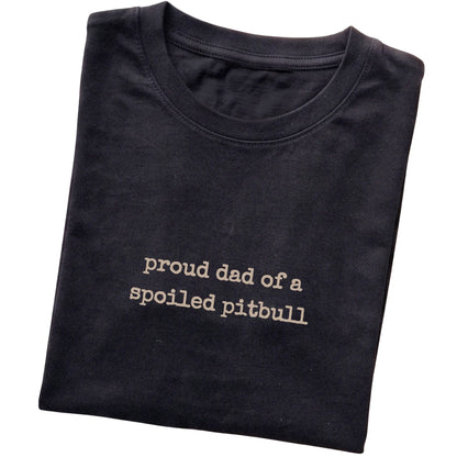 Black Proud Dad of a Spoiled Pitbull T-shirt folded to show the printed design