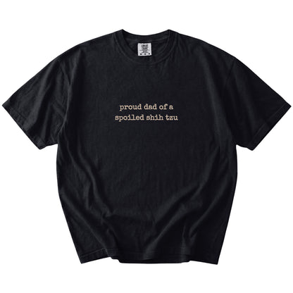 Proud Dad of a Spoiled Shih Tzu lettering on a Black Comfort Colors® T-shirt