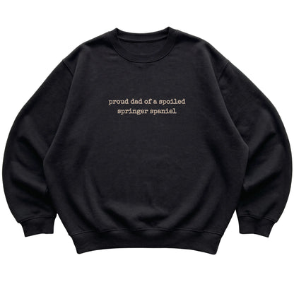 Black Proud Dad of a Spoiled Springer Spaniel sweatshirt laid flat