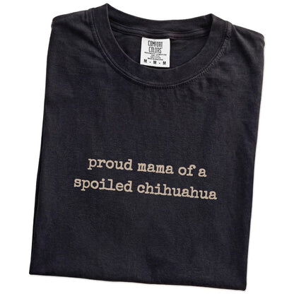 Folded Black Comfort Colors® T-shirt showing Proud Mama of a Spoiled Chihuahua lettering