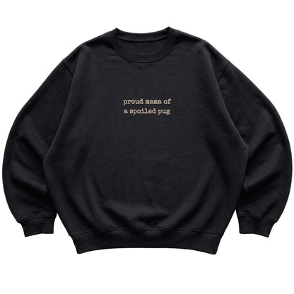 Black Proud Mama of a Spoiled Pug sweatshirt laid flat