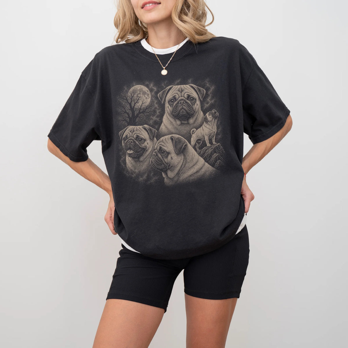 Model wearing a Black Comfort Colors® T-shirt with a vintage moon montage featuring Pug