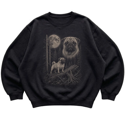 Pug Moonlit Forest graphic on a black crewneck sweatshirt laid flat