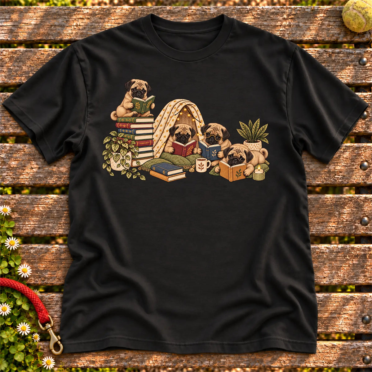 Pug puppies reading books in a cozy blanket fort on a Black T-shirt