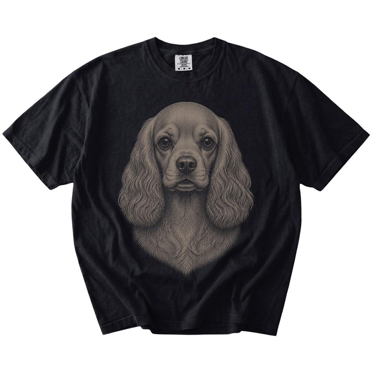 A realistic drawing of a Cocker Spaniel on a Black Comfort Colors® T-shirt