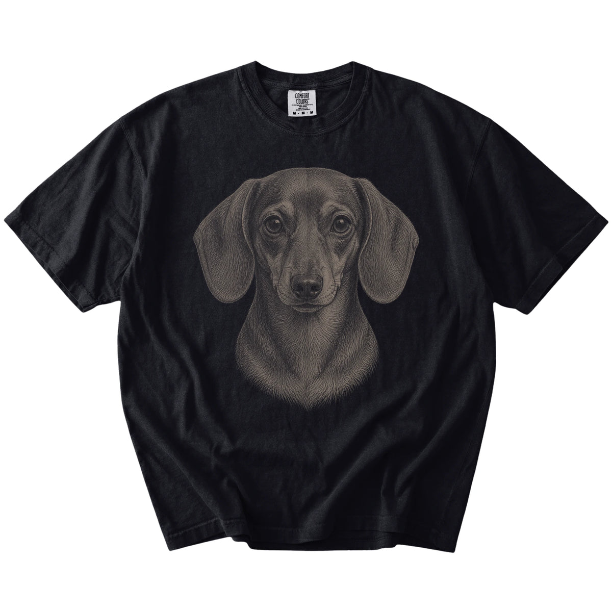 A realistic drawing of a Dachshund on a Black Comfort Colors® T-shirt