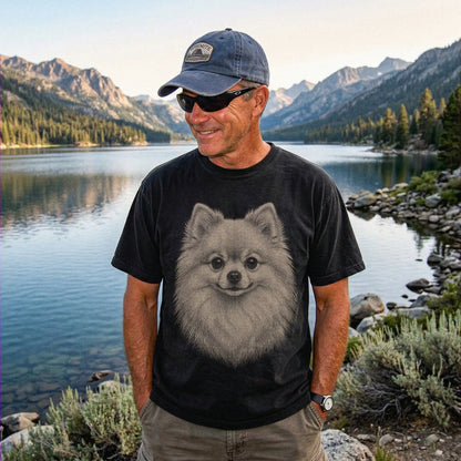 Model wearing a Black Comfort Colors® T-shirt with a realistic drawing of a Pomeranian