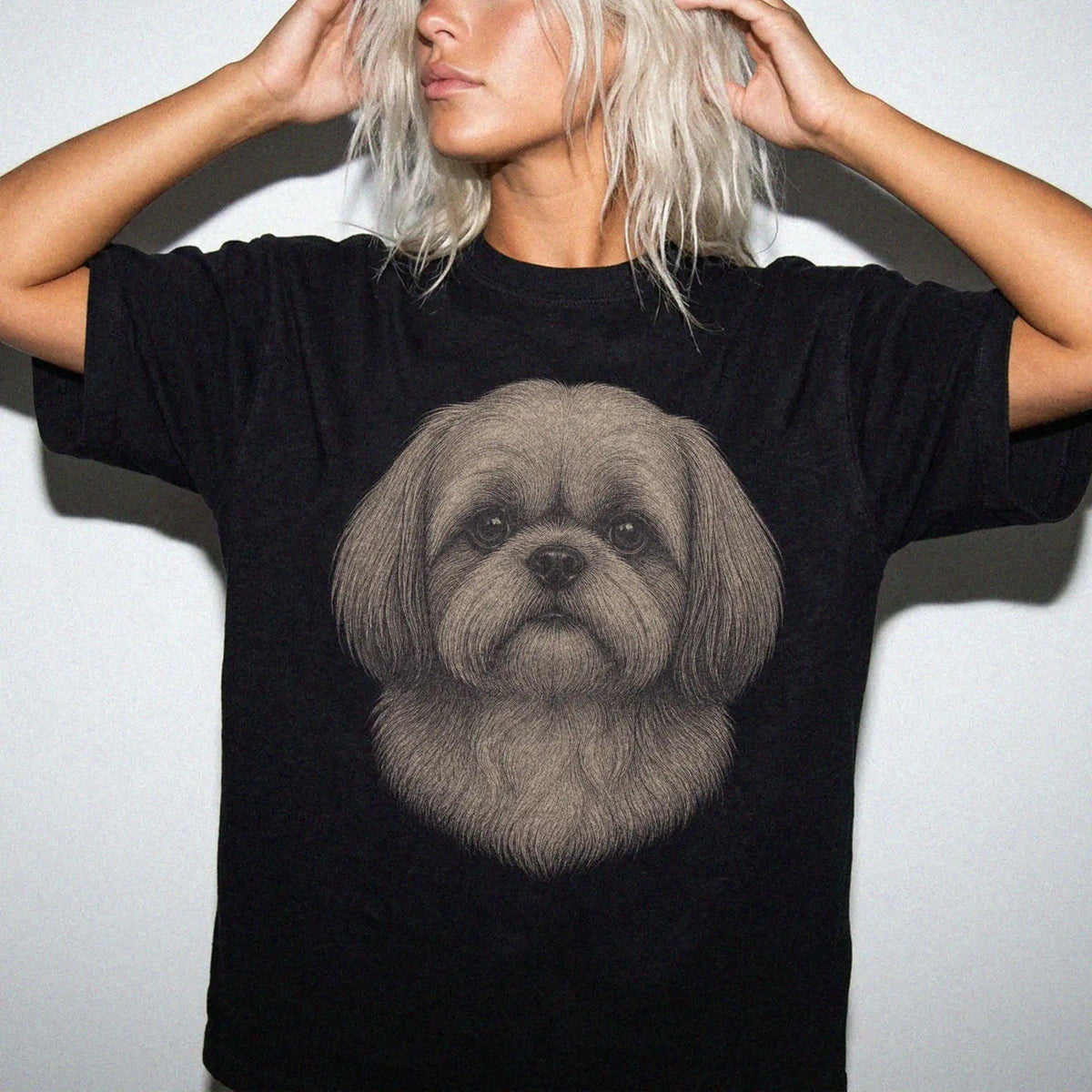 Model wearing a Black Comfort Colors® T-shirt with a realistic drawing of a Shih Tzu