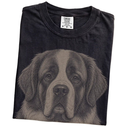Folded Black Comfort Colors® T-shirt showing a realistic drawing of a St Bernard