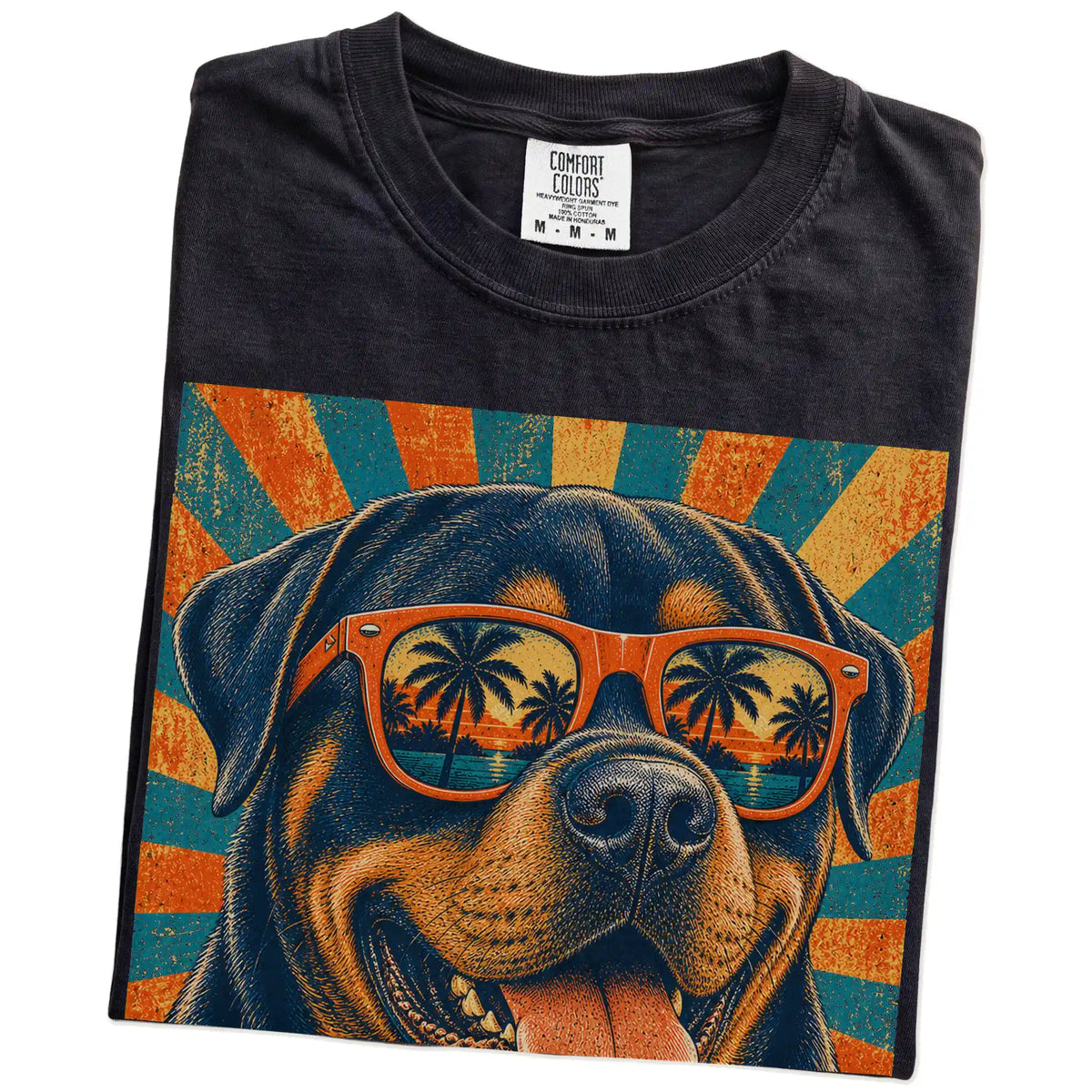 Retro Rottweiler Dad design on a Black Comfort Colors T-shirt folded detail