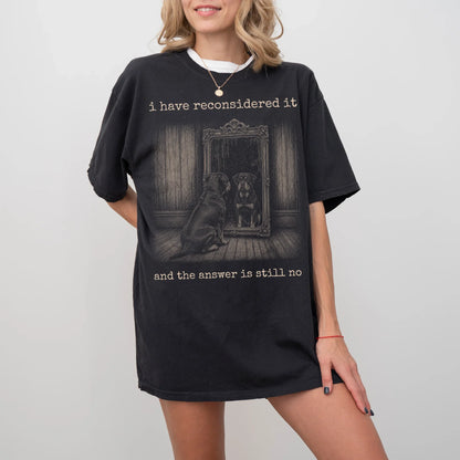 Model wearing a Black Comfort Colors® T-shirt with “the answer is still no” rottweiler design