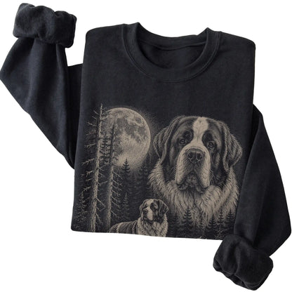 Folded black crewneck sweatshirt showing the Saint Bernard Moonlit Forest graphic