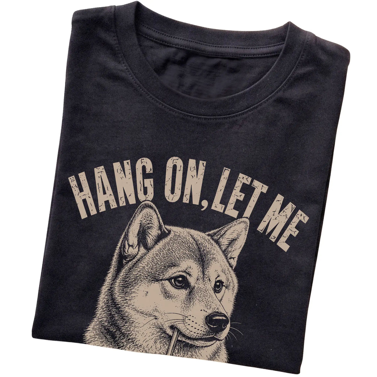 Black T-shirt featuring Overthinking Shiba Inu, folded presentation