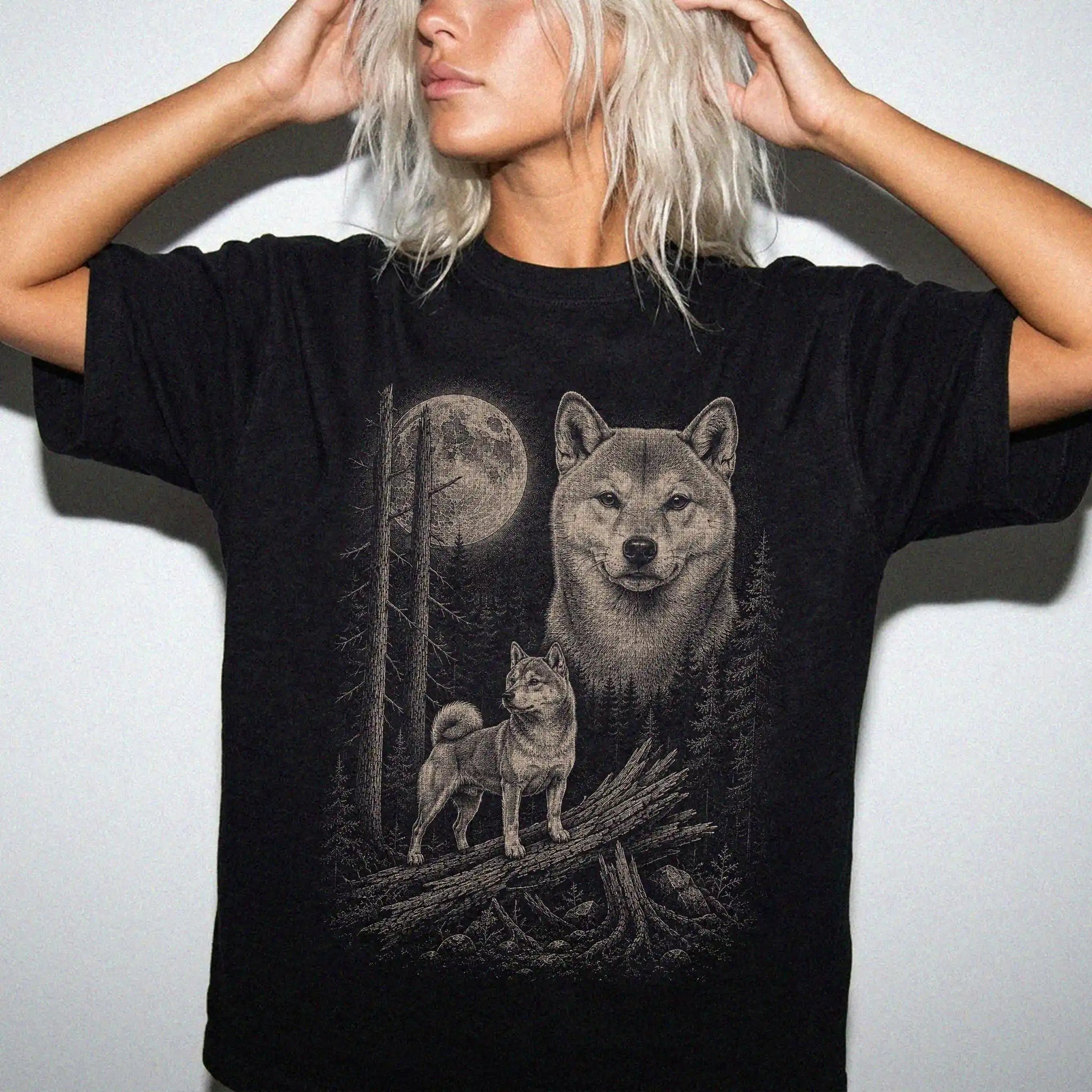 Woman wearing a Black Shiba Inu Moonlit Forest T-Shirt