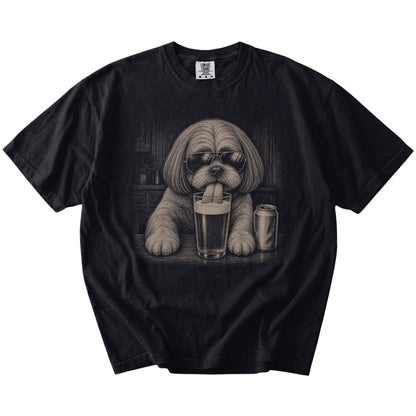 Shih Tzu sneaking a drink from a foamy pint at home on a Black Comfort Colors® t-shirt