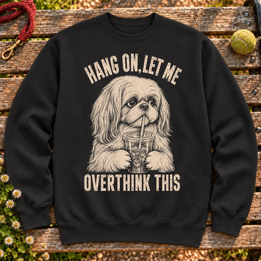 Shih Tzu Iced Coffee Overthink on a Black crewneck sweatshirt, shown flat