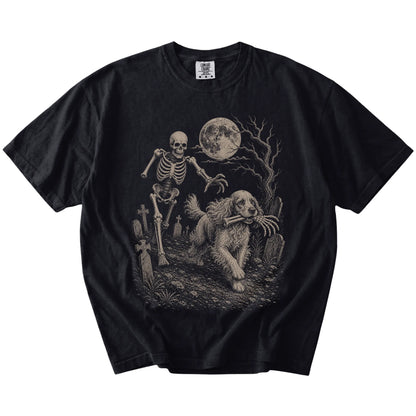 Cocker Spaniel running from a skeleton on a Black Comfort Colors® T-shirt