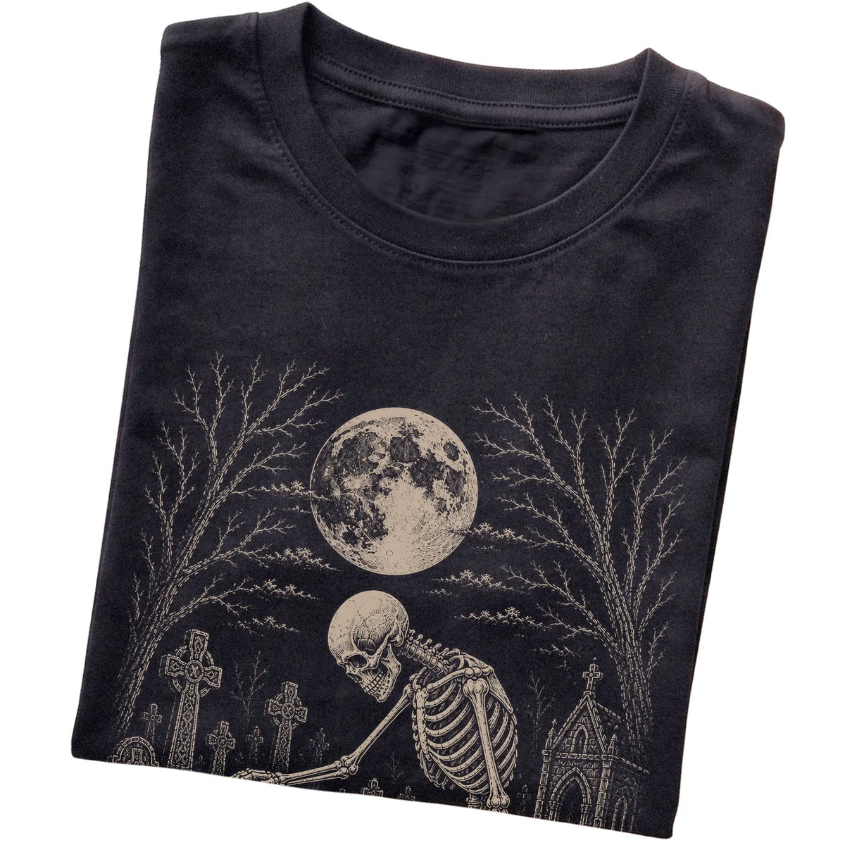 Folded Black T-shirt with a skeleton petting a Beagle in a graveyard