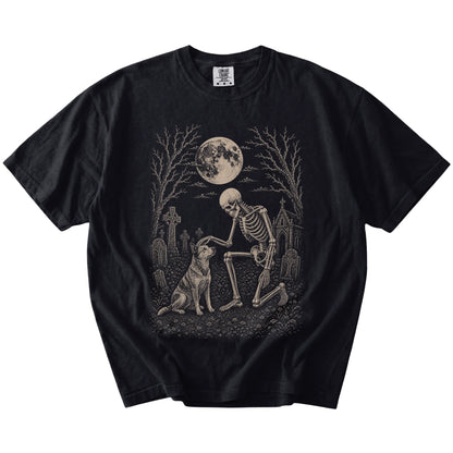 Blue Heeler sharing a quiet cemetery moment with a friendly skeleton on a Black Comfort Colors® T-shirt
