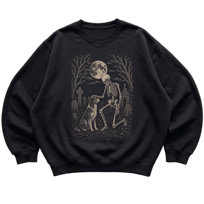 Skeleton petting a Border Collie in a graveyard on a Black sweatshirt