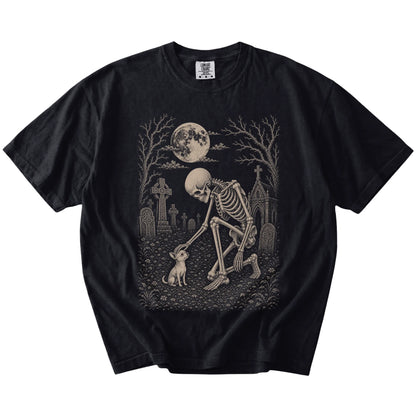 Chihuahua sharing a quiet cemetery moment with a friendly skeleton on a Black Comfort Colors® T-shirt