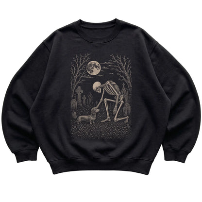 Skeleton petting a Dachshund in a graveyard on a Black sweatshirt