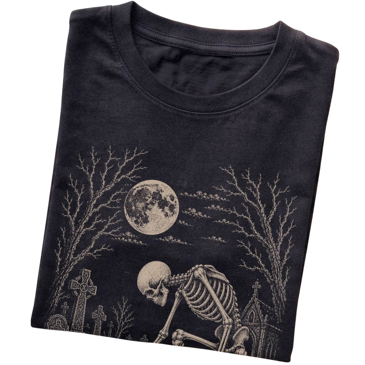 Folded Black T-shirt with a skeleton petting a Dachshund in a graveyard