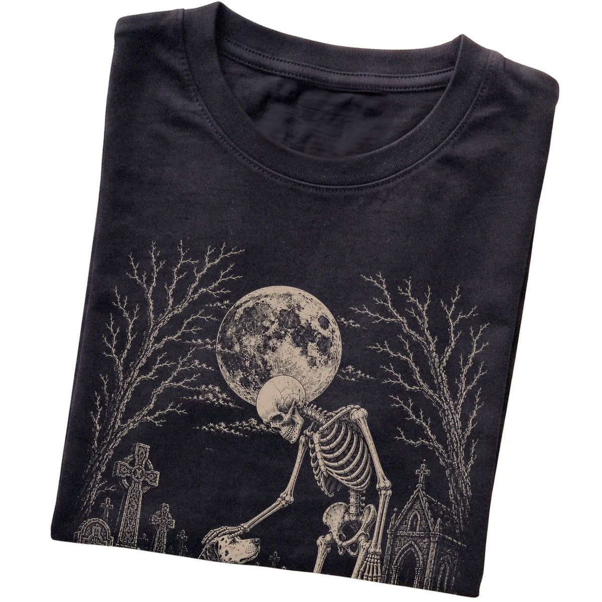 Folded Black T-shirt with a skeleton petting a Dalmatian in a graveyard