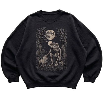Skeleton petting a French Bulldog in a graveyard on a Black sweatshirt
