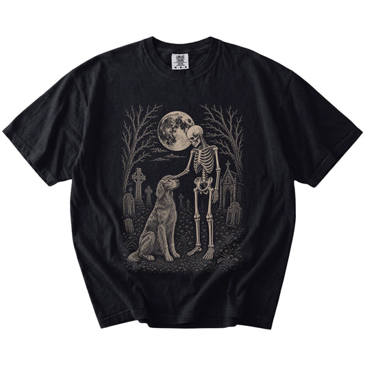 Irish Setter sharing a quiet cemetery moment with a friendly skeleton on a Black Comfort Colors® T-shirt