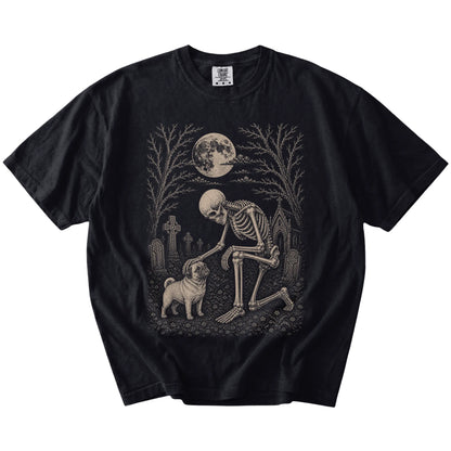 Pug sharing a quiet cemetery moment with a friendly skeleton on a Black Comfort Colors® T-shirt