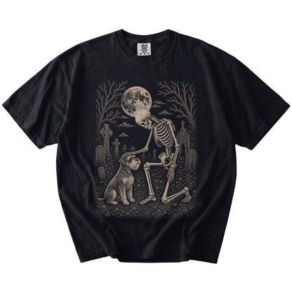Schnauzer sharing a quiet cemetery moment with a friendly skeleton on a Black Comfort Colors® T-shirt