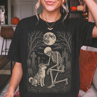 Model wearing a Black Comfort Colors® T-shirt showing Shiba Inu sharing a quiet cemetery moment with a friendly skeleton