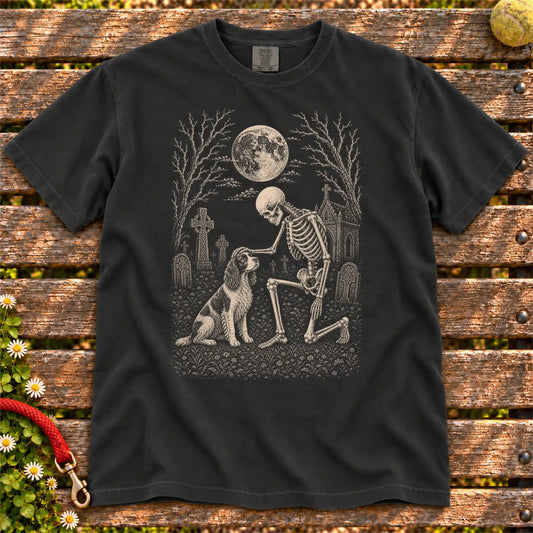 Springer Spaniel sharing a quiet cemetery moment with a friendly skeleton on a Black Comfort Colors® T-shirt