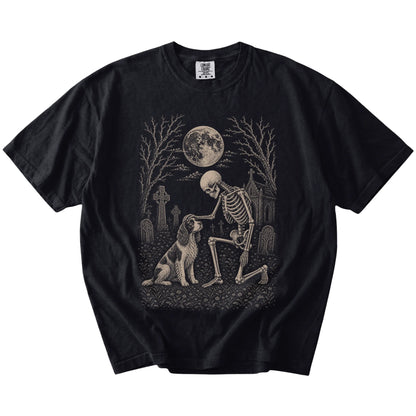 Springer Spaniel sharing a quiet cemetery moment with a friendly skeleton on a Black Comfort Colors® T-shirt