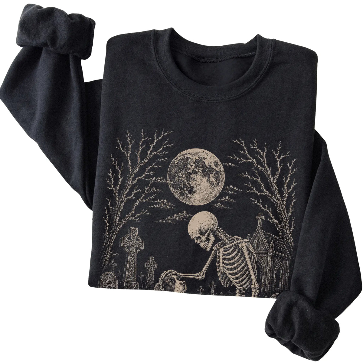 Folded Black sweatshirt with a skeleton petting a Springer Spaniel in a graveyard