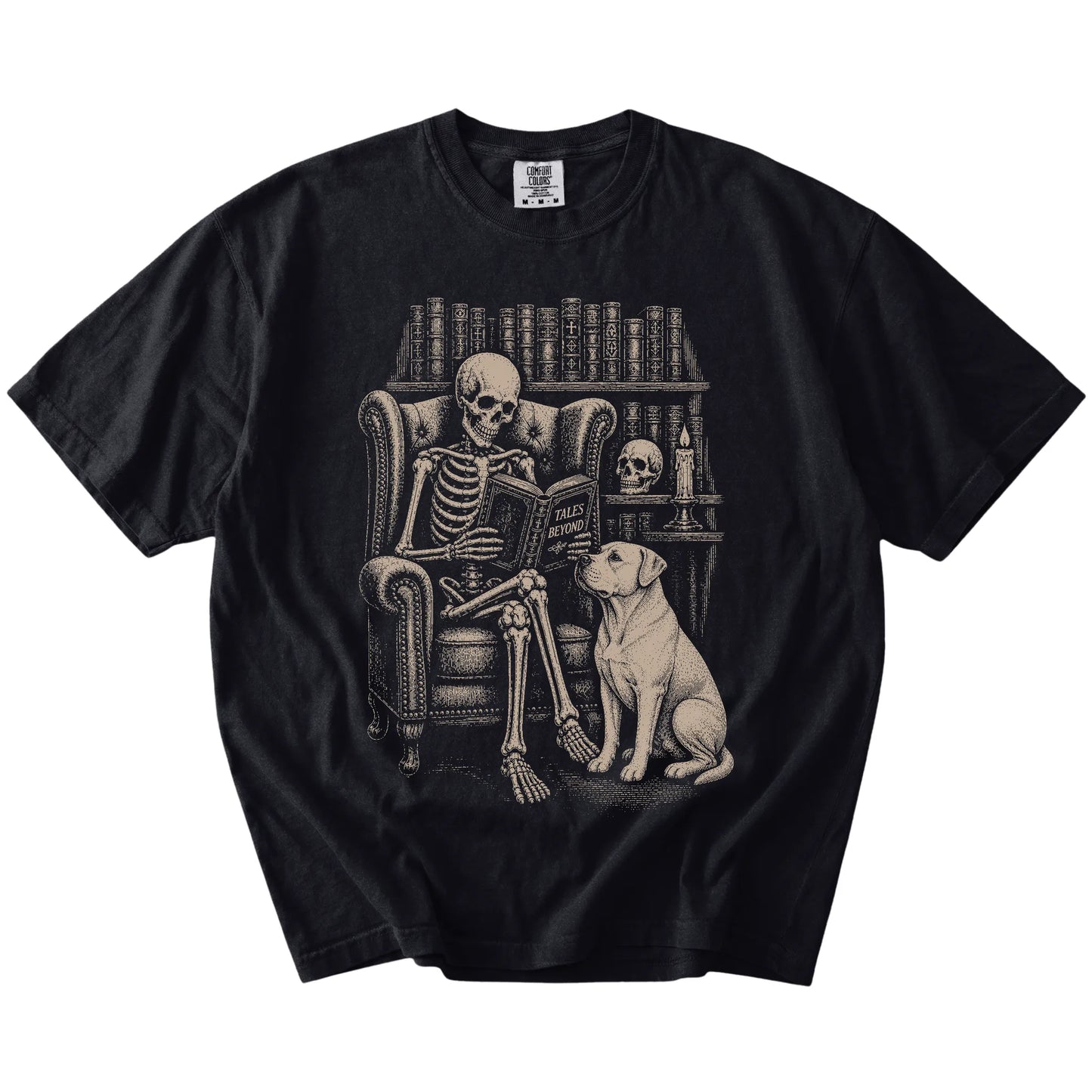 Skeleton reading in a library beside a American Bulldog on a Black Comfort Colors® T-shirt