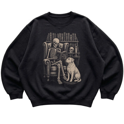 Skeleton reading Tales Beyond to an American Bulldog on a Black sweatshirt