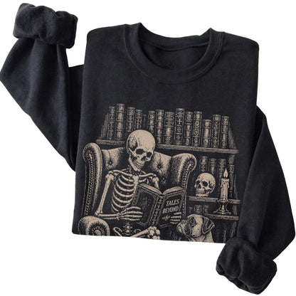 Folded Black sweatshirt with a skeleton reading Tales Beyond to a Boxer