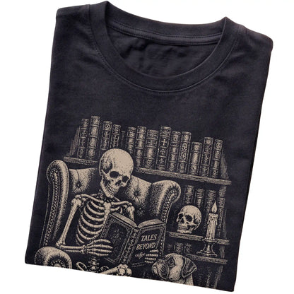 Folded Black T-shirt with a skeleton reading Tales Beyond to a Boxer
