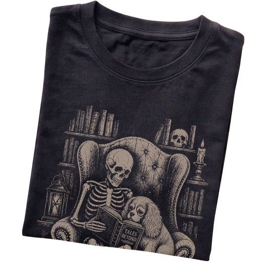 Folded Black T-shirt with a skeleton reading Tales Beyond to a Cavalier